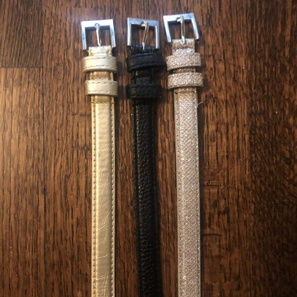 Set of women's size small belts